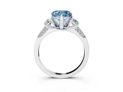 Fancy Blue Heart Cut Diamond Three-Stone Ring Set in White gold with Pavé Band and Smaller Side Stones