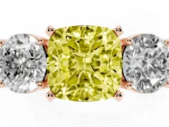 Fancy Yellow Cushion Cut Diamond Three-Stone Ring Set in Rose gold with Round Side Stones and Classic Band