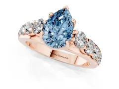 Fancy Blue Pear Cut Diamond Pavé Engagement Ring Set in Rose gold with Prong Setting