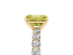 Fancy Yellow Emerald Cut Diamond Solitaire Ring Set in Yellow gold with Shared Prong Pavé Band