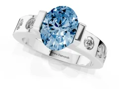 Fancy Blue Oval Cut Diamond Channel-Set Band Ring Set in Platinum with Bezel Prong Setting