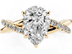 Pear Cut Diamond Twisted Pavé Band Ring Set in Yellow gold with Prong Setting