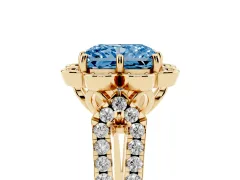 Fancy Blue Radiant Cut Diamond Floral Halo Split Shank Engagement Ring Set in Yellow gold with Pavé Shank