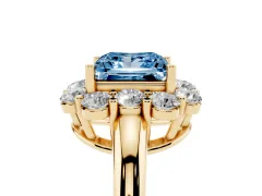 Fancy Blue Princess Cut Diamond Milgrain Halo Solitaire Ring Set in Yellow gold with Bezel Set Side Stones and Pavé Band