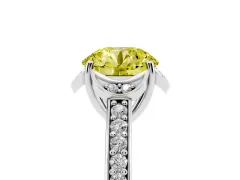 Fancy Yellow Round Cut Diamond Halo Ring Set in White gold with Channel Set Band and Prong Setting