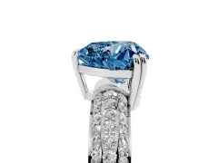 Fancy Blue Heart Cut Diamond Solitaire Ring Set in Platinum with Multi-Row Round Pavé Band and Prong Setting