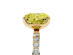 Fancy Yellow Radiant Cut Diamond Solitaire Engagement Ring Set in Yellow gold with Round Pavé Band and Prong Setting