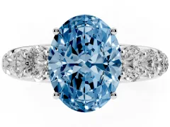 Fancy Blue Oval Cut Diamond Solitaire Ring Set in Silver with Pavé-Set Band and Prong Setting