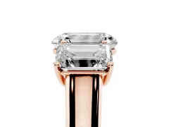 Emerald Cut Diamond Three-Stone Ring Set in Rose gold with Plain Polished Band