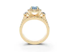 Fancy Blue Oval Cut Diamond Halo Split Shank Ring Set in Yellow gold with Round Accent Stones and Prong Setting