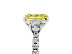 Fancy Yellow Emerald Cut Diamond Three-Stone Ring Set in Silver with Pavé Band and Graduated Sides