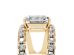 Emerald Cut Diamond Split Shank Pavé Solitaire Ring Set in Yellow gold with Open Shank Design