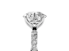 Round Cut Diamond Solitaire Engagement Ring Set in White gold with Round Pavé Band and Prong Setting