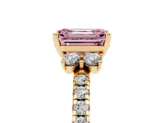 Fancy Pink Emerald Cut Diamond Three-Stone Pavé Ring Set in Yellow gold with Prong Setting