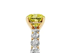 Fancy Yellow Cushion Cut Diamond Solitaire Ring Set in Yellow gold with Shared Prong Pavé Band