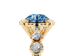 Fancy Blue Round Cut Diamond Floral Halo Ring Set in Yellow gold with Shared Prong Band
