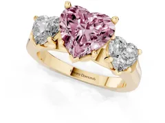 Fancy Pink Heart Cut Diamond Three-Stone Trellis Ring Set in Yellow gold with Comfort Fit Band