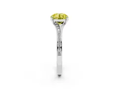 Fancy Yellow Round Cut Diamond Solitaire Ring Set in White gold with Pavé Accent Band and Classic Prong Setting