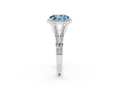 Fancy Blue Oval Cut Diamond Halo Split Shank Pavé Ring Set in White gold with Prong Setting