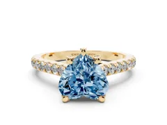 Fancy Blue Heart Cut Diamond Solitaire Ring Set in Yellow gold with Brilliant Pavé Band and Prong Setting