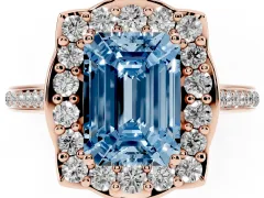 Fancy Blue Emerald Cut Diamond Halo Ring Set in Rose gold with Pavé-Lined Shoulders and Prong Setting