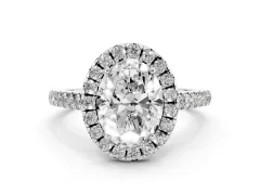 Oval Cut Diamond Pavé Halo Engagement Ring Set in Silver with Pavé Band and Prong Setting