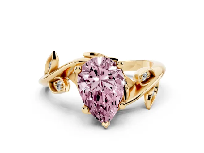 Fancy Pink Pear Cut Diamond Solitaire Twist Engagement Ring Set in Yellow gold with Pavé Leaf Accents