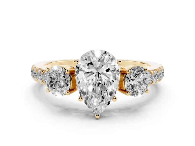 Pear Cut Diamond Three-Stone Ring Set in Yellow gold with Round Side Stones and Delicate Pavé Band