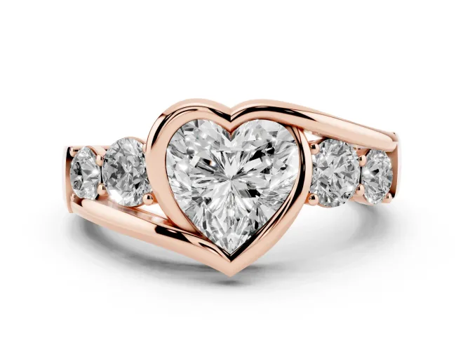 Heart Cut Diamond Bezel Bypass Ring Set in Rose gold with Round Accents