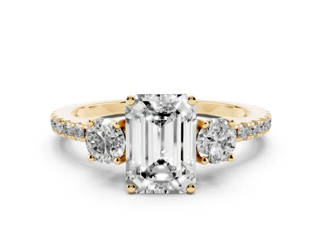 Emerald Cut Diamond Three-Stone Ring Set in Yellow gold with Pavé Band and Graduated Sides
