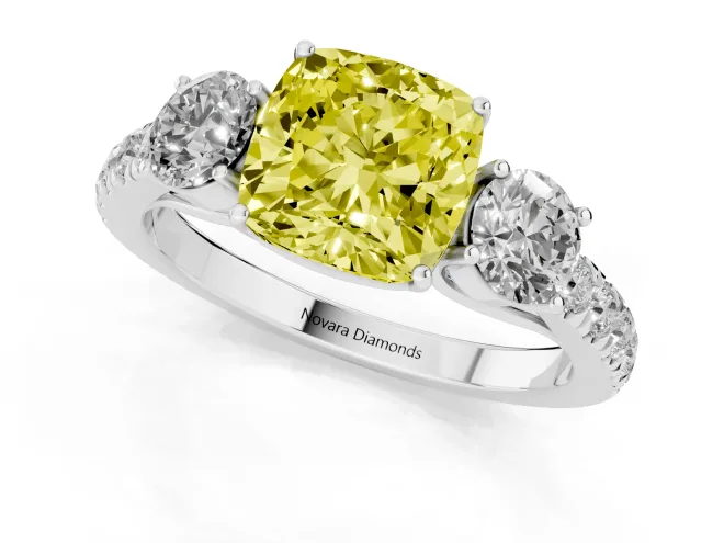 Fancy Yellow Cushion Cut Diamond Three-Stone Ring Set in Platinum with Round Side Stones and Delicate Pavé Band – second view