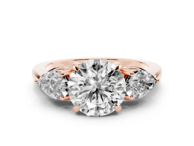 Round Cut Diamond Three-Stone Ring Set in Rose gold with Pear Side Stones