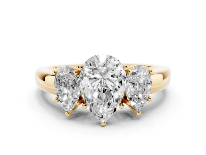 Pear Cut Diamond Three-Stone Ring Set in Yellow gold with Bold Center and Classic Band