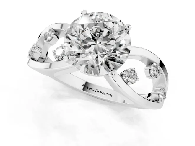 Round Cut Diamond Solitaire Ring Set in Silver with Side Stones on Criss-Cross Band and Prong Setting – second view