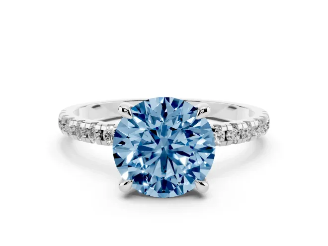 Fancy Blue Round Cut Diamond Brilliant Solitaire Ring Set in Platinum with Pavé Band and Prong Setting