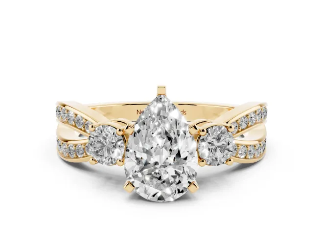 Three-Stone Pear Cut Diamond Twist Band Ring Set in Yellow gold with Pavé Accents and Prong Setting