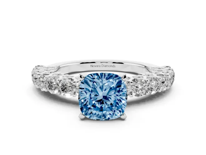 Fancy Blue Cushion Cut Diamond Solitaire Ring Set in White gold with Shared Prong Pavé Band