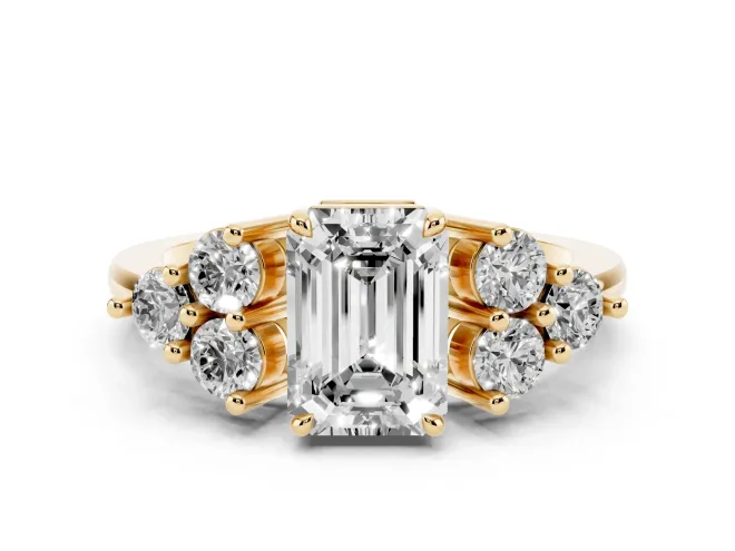 Emerald Cut Diamond Solitaire Ring Set in Yellow gold with Cluster Accents on Each Side