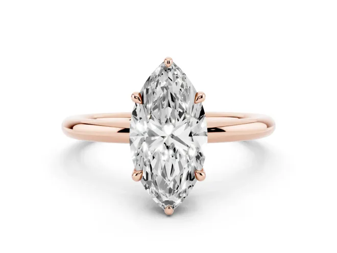 Marquise Cut Diamond Solitaire Ring Set in Rose gold with Thin Band and Prong Setting