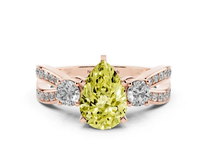 Pear-Shaped Three-Stone Twist Engagement Ring Setting for a Fancy Yellow Lab-Grown Diamond | Rose Gold