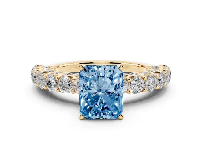 Fancy Blue Radiant Cut Diamond Solitaire Ring Set in Yellow gold with Shared Prong Pavé Band