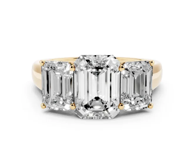 Emerald Cut Diamond Three-Stone Ring Set in Yellow gold with Plain Polished Band