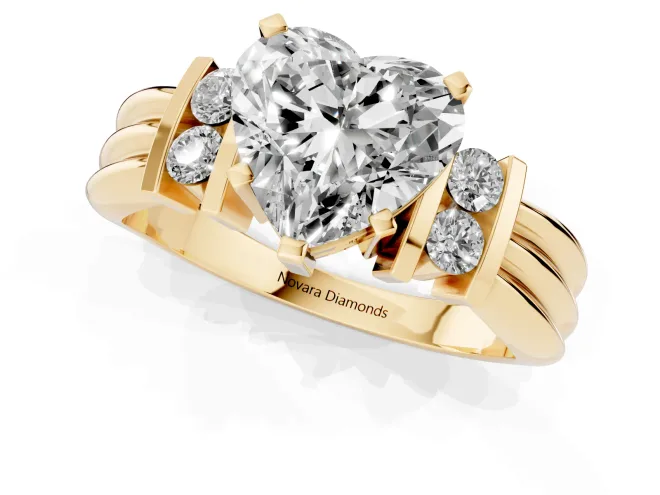 Three-Stone Heart Cut Diamond Channel Set Ring Set in Yellow gold with Bar Prongs – second view
