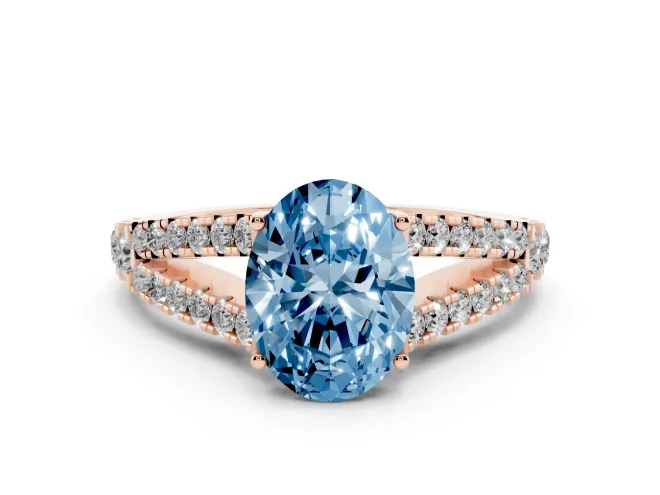 Fancy Blue Oval Cut Diamond Split Shank Pavé Engagement Ring Set in Rose gold with Prong-Held Center Stone