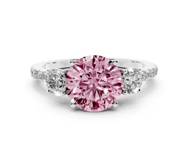 Fancy Pink Round Cut Diamond Three-Stone Ring Set in White gold with Pavé Band and Graduated Sides