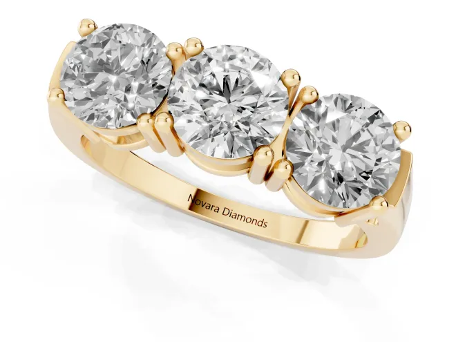 Round Cut Diamond Three-Stone Ring Set in Yellow gold with Channel Band and Sturdy Prongs – second view