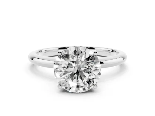 Round Cut Diamond Solitaire Engagement Ring Set in White gold with Prong Setting and Polished Band