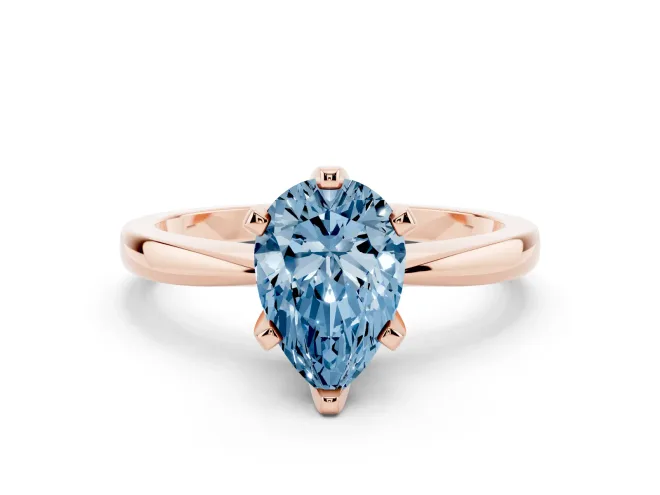 Fancy Blue Pear Cut Diamond Solitaire Engagement Ring Set in Rose gold with Slim Tapered Solitaire Band