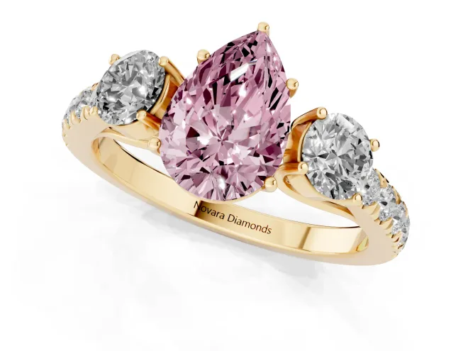 Fancy Pink Pear Cut Diamond Three-Stone Ring Set in Yellow gold with Round Side Stones and Delicate Pavé Band – second view