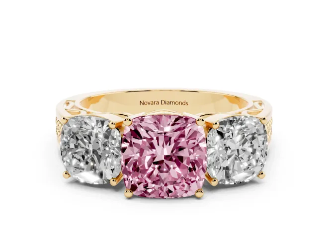 Fancy Pink Cushion Cut Diamond Three-Stone Ring Set in Yellow gold with Textured Band